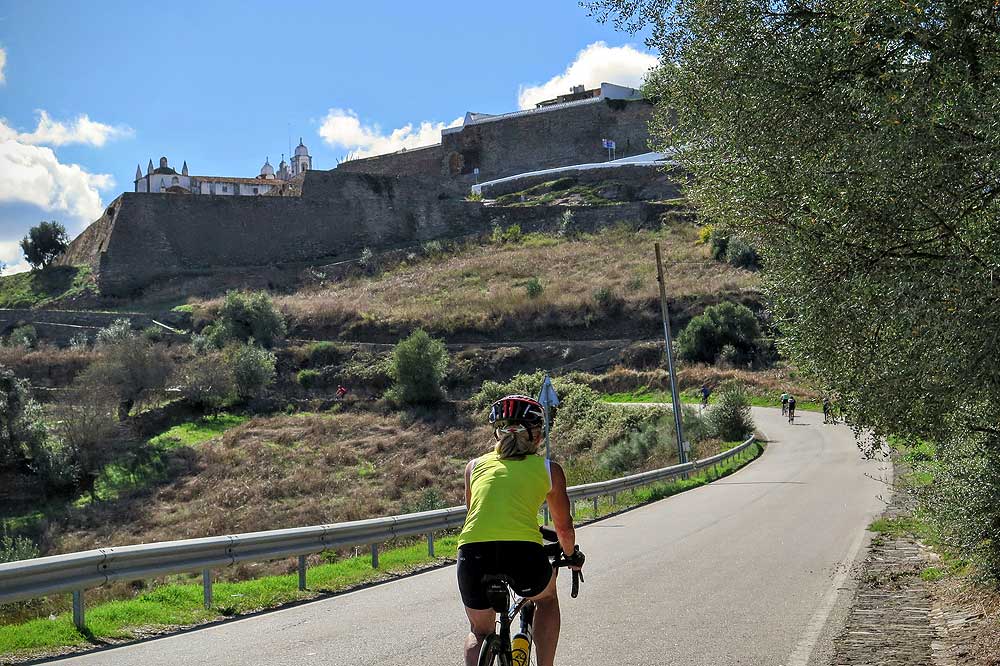 Cycling up to a hilltop village in the Alentejo